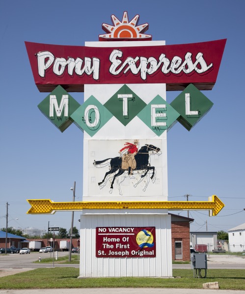 A mid-century modern style sign for the Pony Express Motel. 